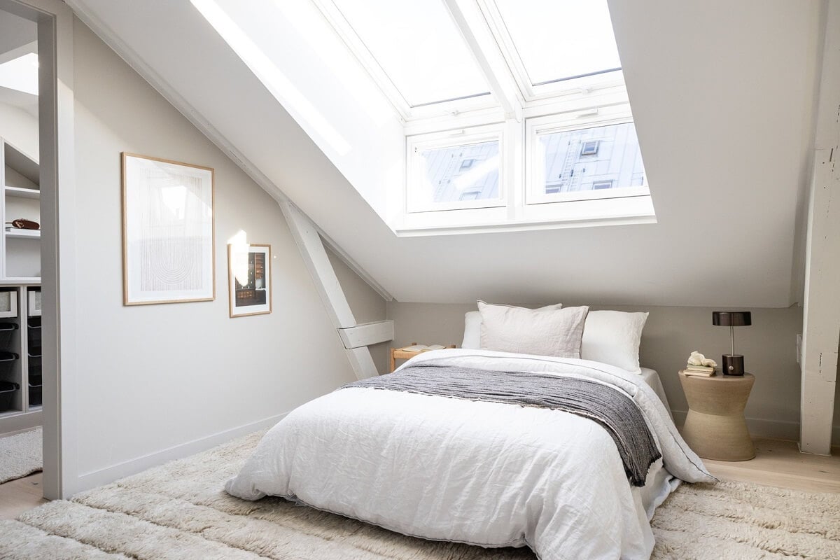 A Bright Penthouse Apartment in Oslo 16 bright-attic-bedroom-large-window-nordroom