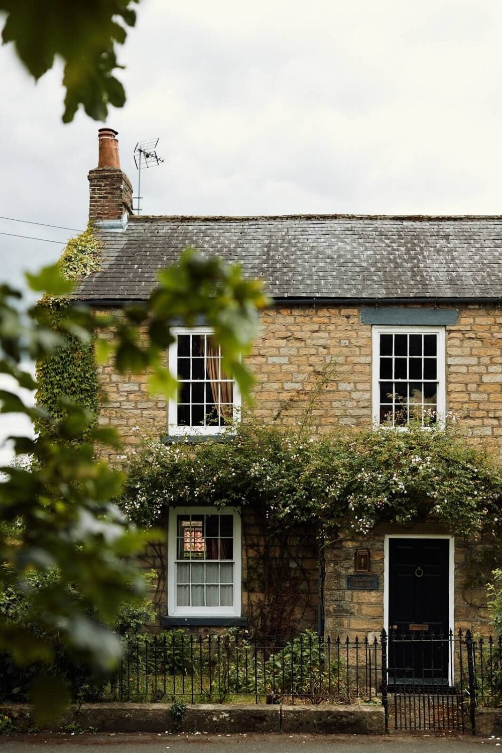 An English Cottage with a Perfect Kitchen 29 climbing-roses-english-cottage-nordroom