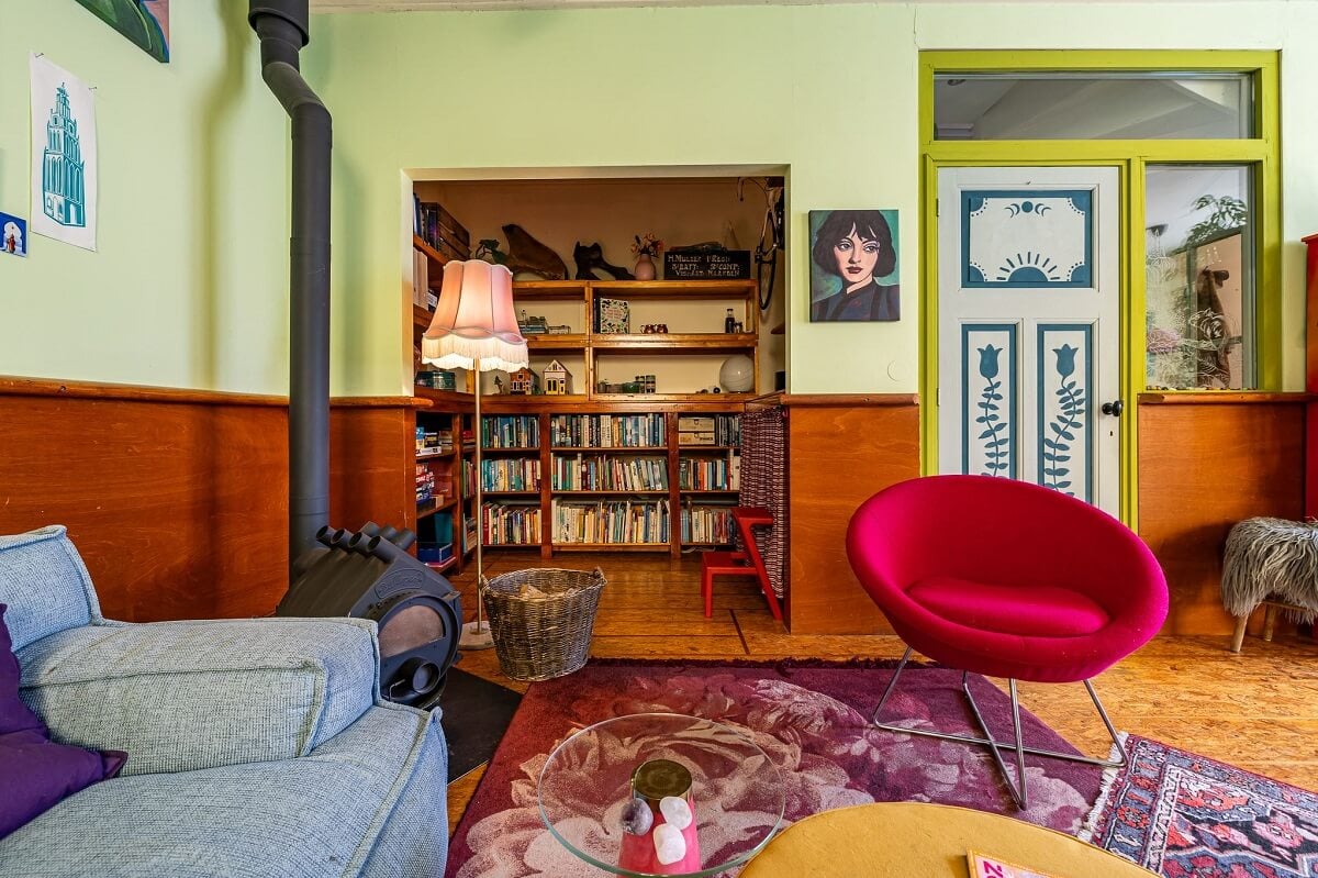 A Colorful Church Conversion in The Netherlands 3 colorful-iving-room-home-library-niche-nordroom