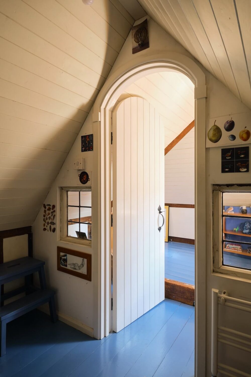 A Colored Sixth Wall May Be The Biggest Paint Trend in 2026 22 cottage-attic-room-blue-painted-floorboards-nordroom