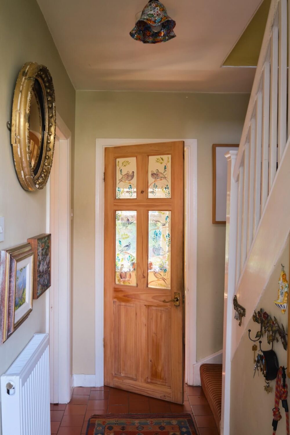 An English Cottage with Blue Color Accents 9 cottage-hallway-wooden-door-nordroom