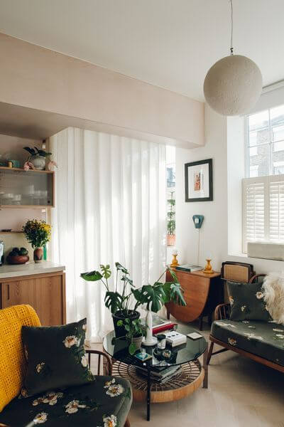 53 Studio Apartments with a Curtain Room Divider 29 curtain-room-divider-plant-filled-studio-nordroom