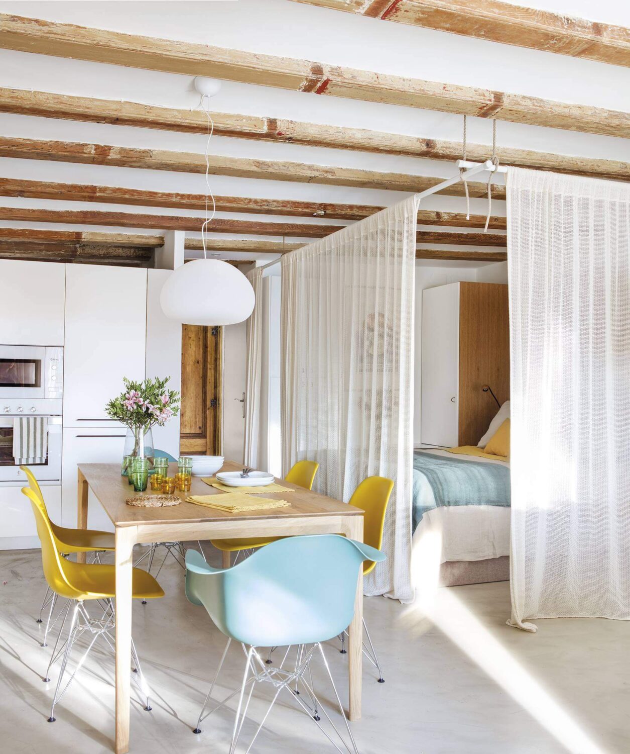 53 Studio Apartments with a Curtain Room Divider 3 curtains-around-bed-light-studio-wooden-beams-nordroom