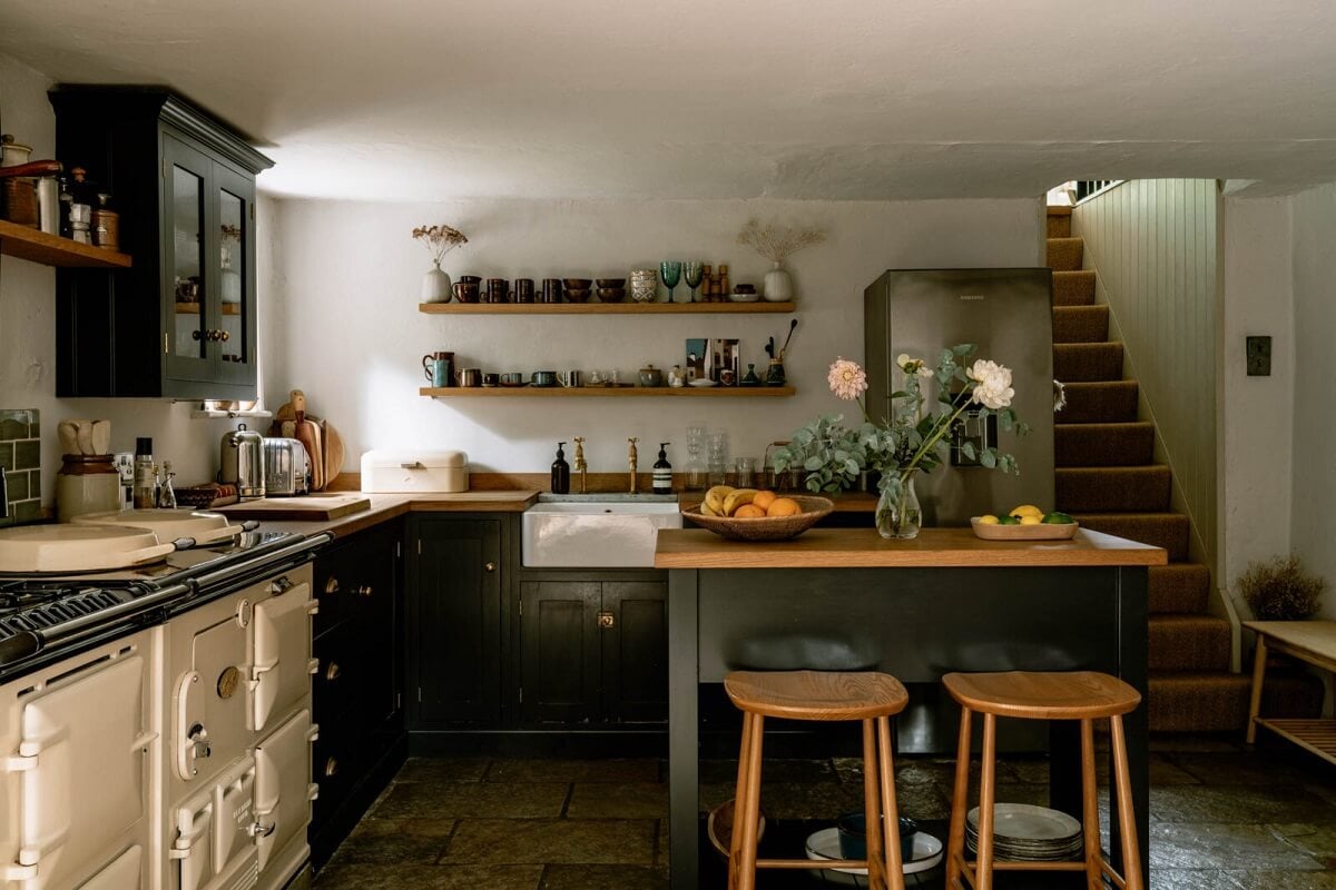 A Warm Living Room in a Historic English Home 8 devol-kitchen-breakfast-bar-stone-floor-aga-cooker-nordroom