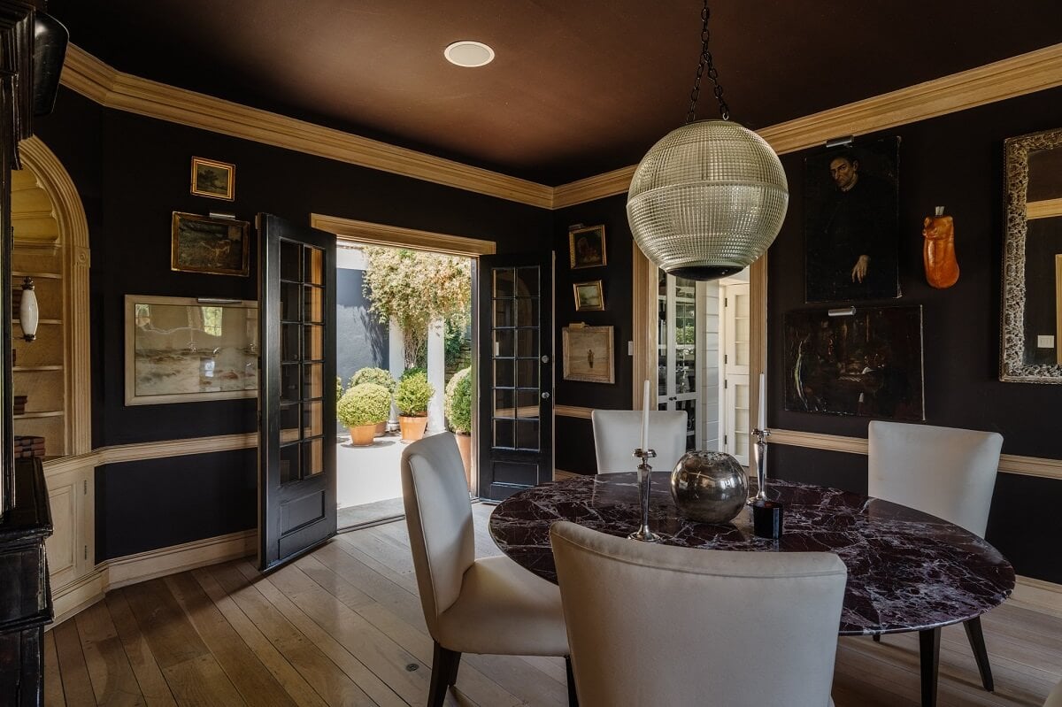 Black Accents in a Traditional Los Angeles Home 15 dining-room-round-dining-table-black-walls-ceiling-nordroom