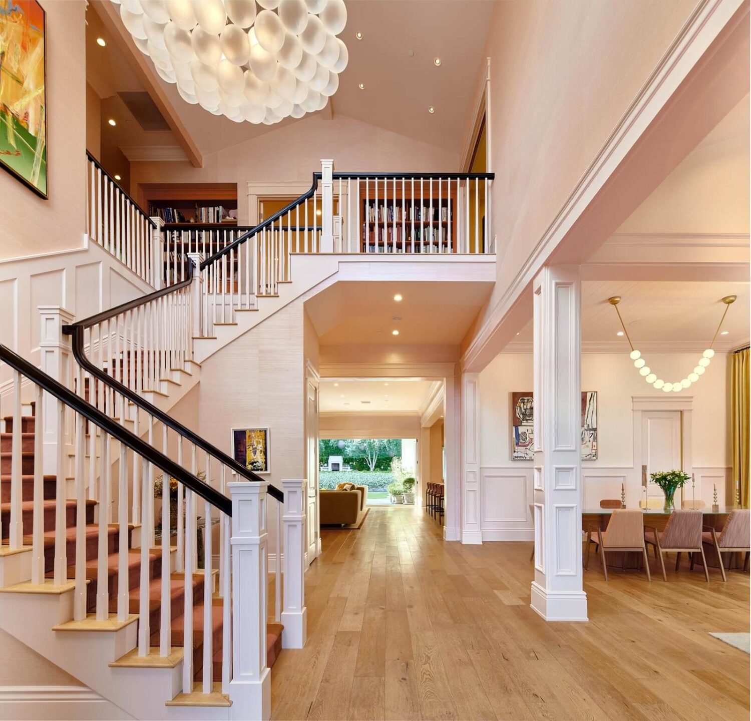 17 Shades of Pink in Fredrik Eklund's Beverly Hills Home 1 double-height-foyer-living-space-pink-wallpaper-nordroom