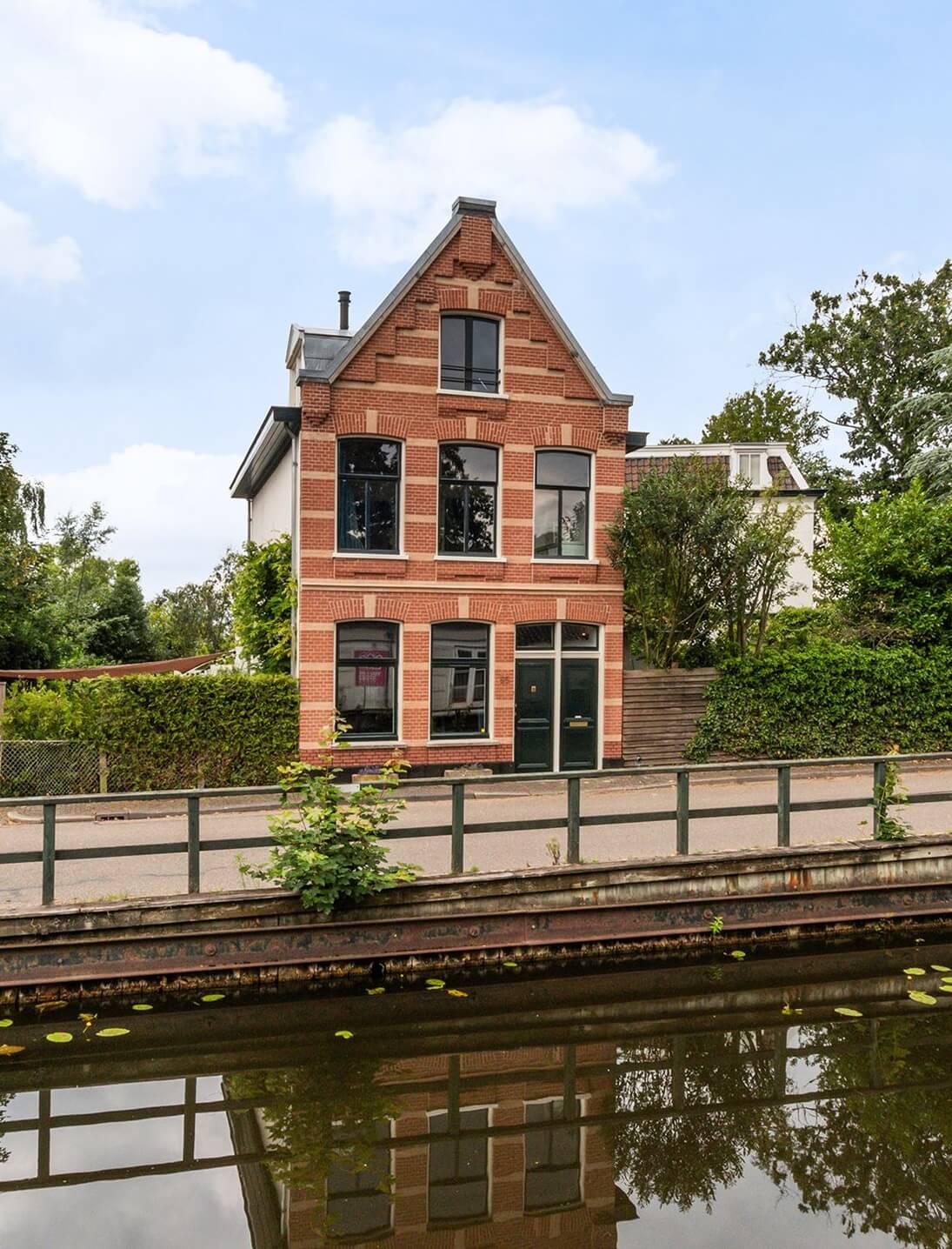 A Charming Colorful House in The Netherlands 17 dutch-house-pitched-roof-canal-nordroom