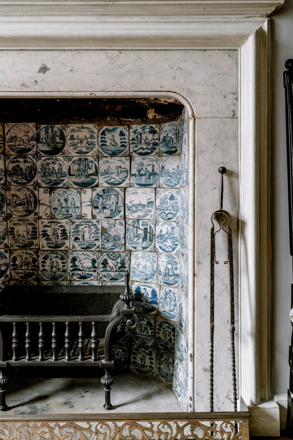 A Unique Historic House Near the English Coast 20 fireplace-detail-tiles