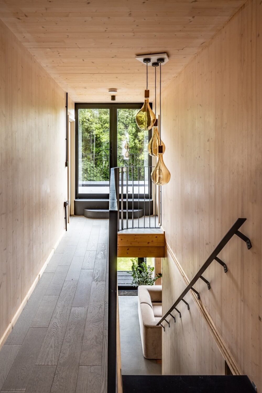 A Modern English Home with a Sculptural Facade 15 first-floor-landing-wooden-walls-nordroom