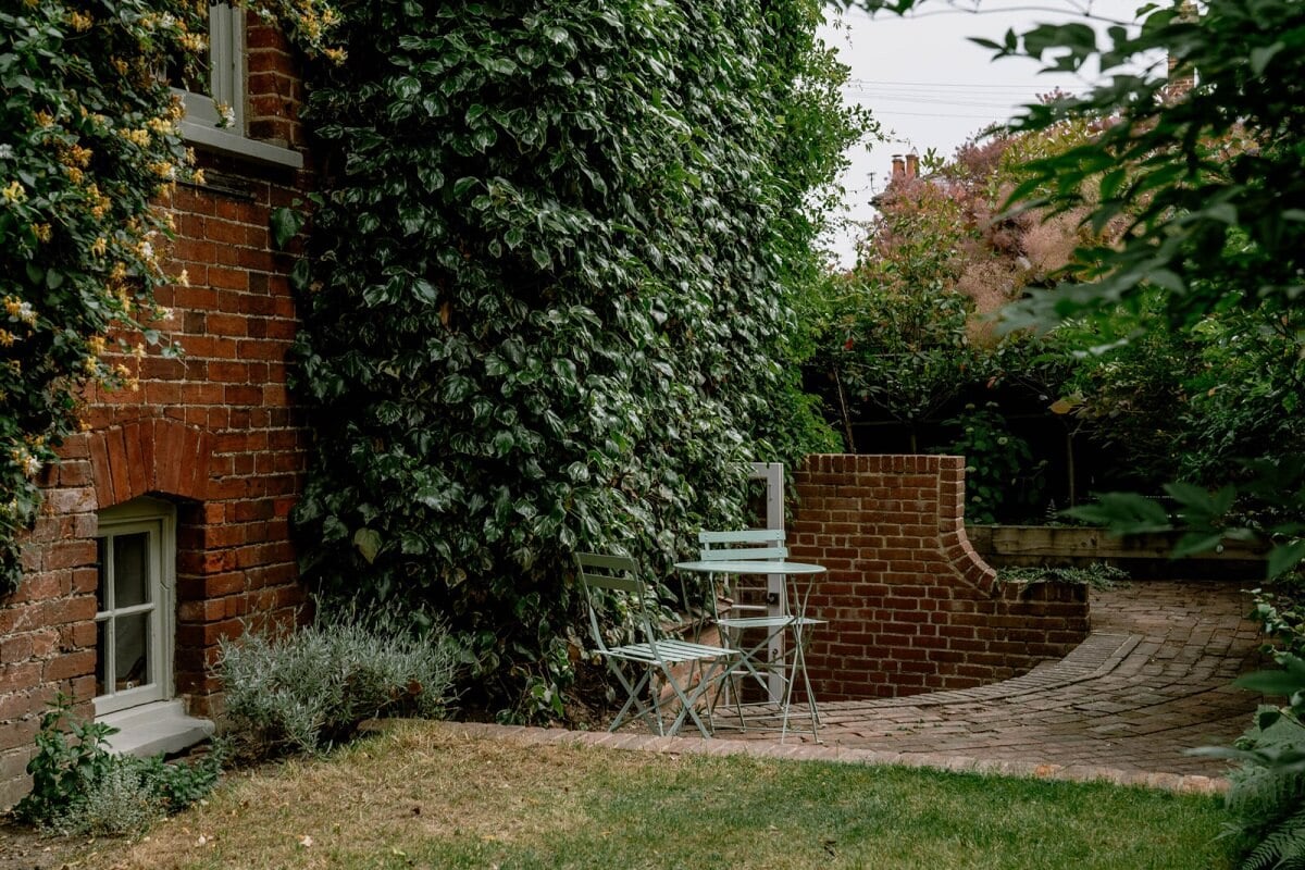 A Warm Living Room in a Historic English Home 24 garden-bistro-seating-nordroom