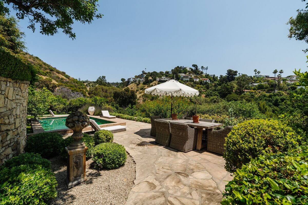 Black Accents in a Traditional Los Angeles Home 42 garden-dining-area-swimming-pool-nordroom