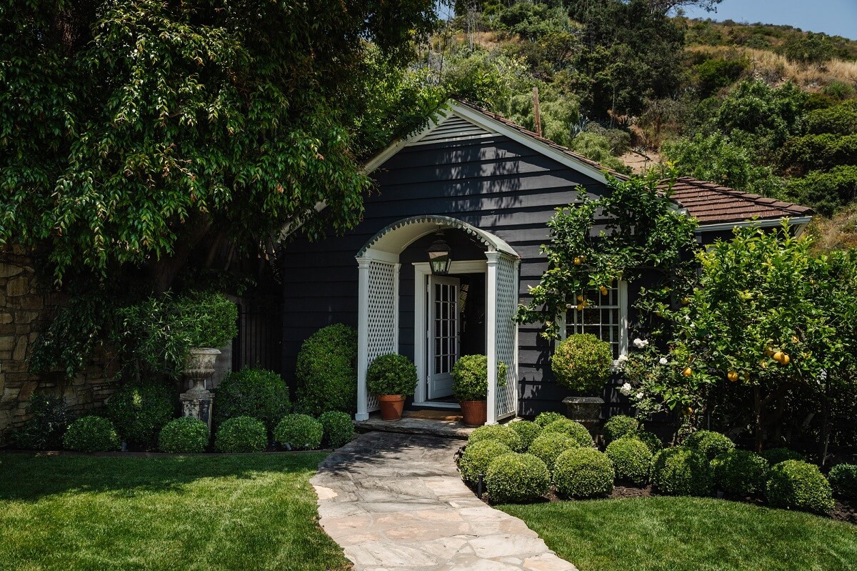Black Accents in a Traditional Los Angeles Home 45 garden-guest-house-nordroom