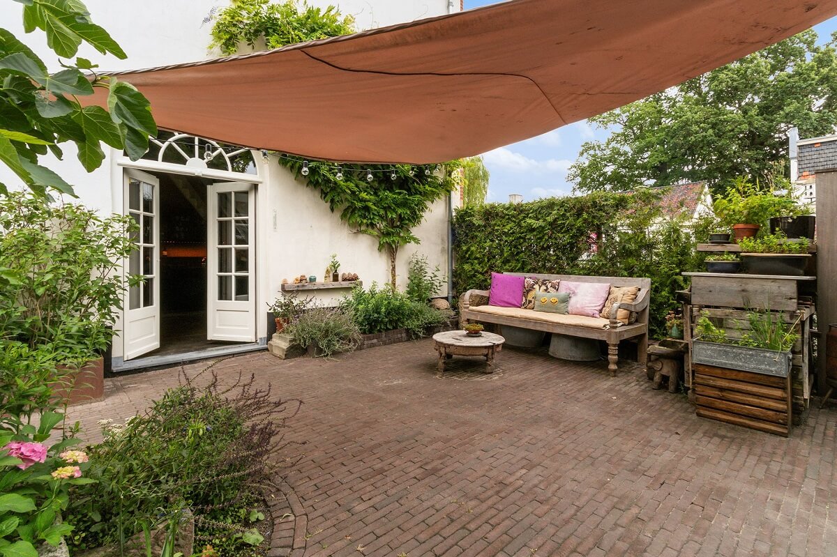 A Charming Colorful House in The Netherlands 16 garden-seating-charming-colorful-dutch-house-nordroom