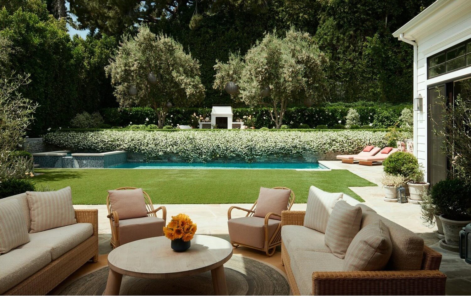 17 Shades of Pink in Fredrik Eklund's Beverly Hills Home 23 garden-swimming-pool-seating-nordroom