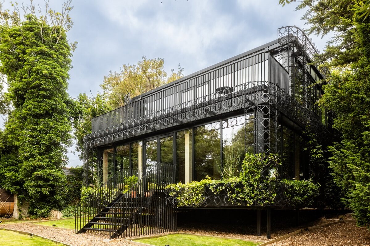 A Modern English Home with a Sculptural Facade 1 glasswork-sculptural-exterior-nordroom