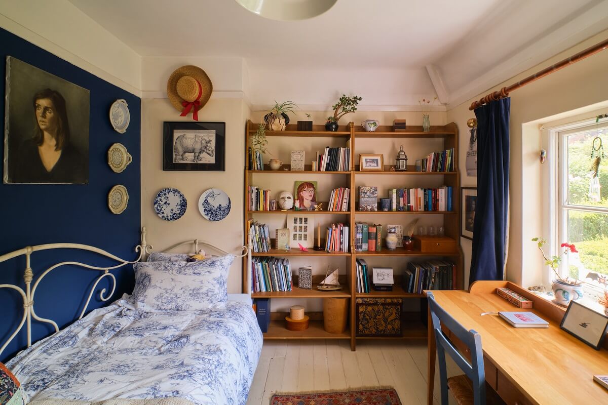 An English Cottage with Blue Color Accents 14 guest-bedroom-blue-wall-desk-nordroom