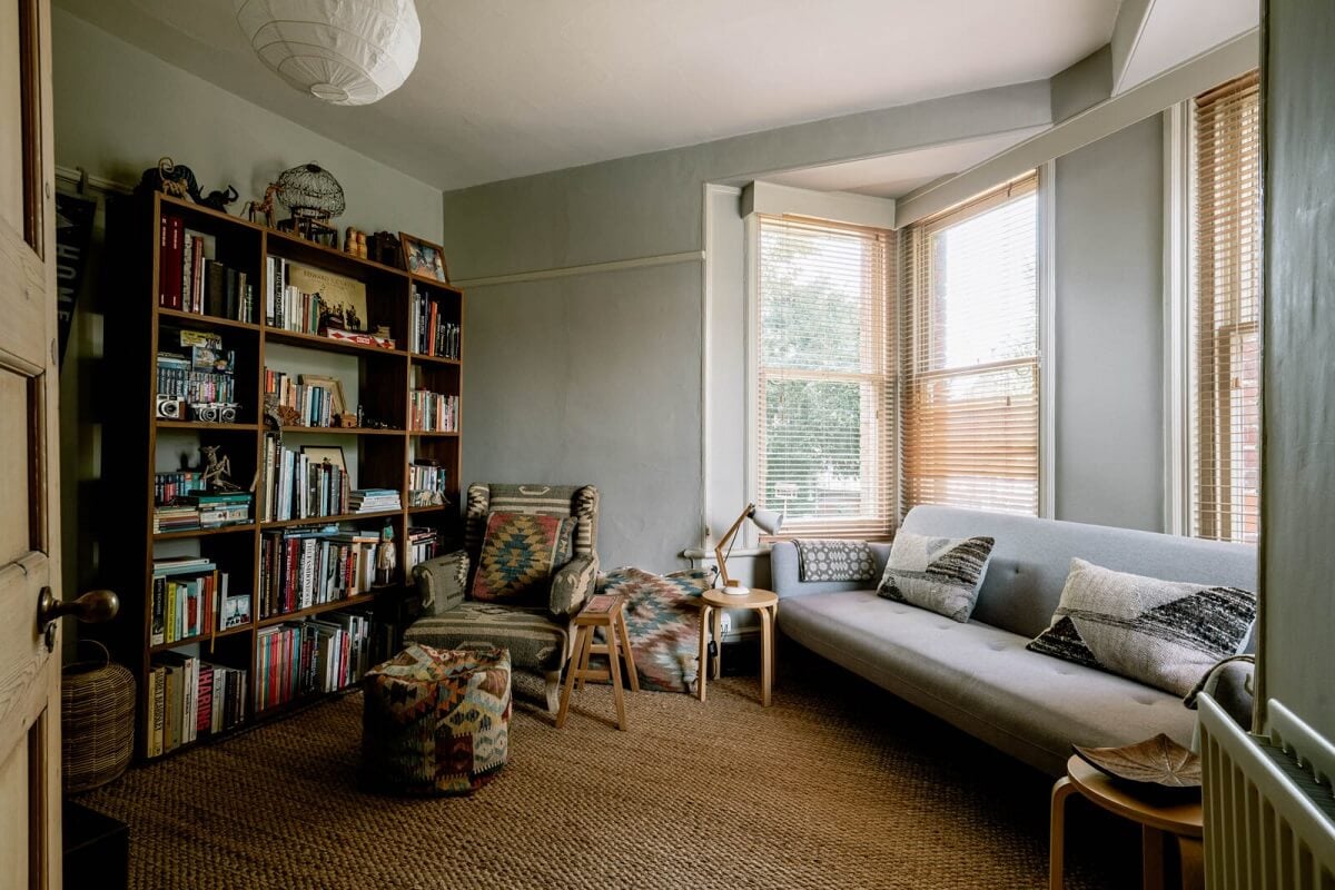 A Warm Living Room in a Historic English Home 6 guest-room-library-bay-window-bookshelves-nordroom
