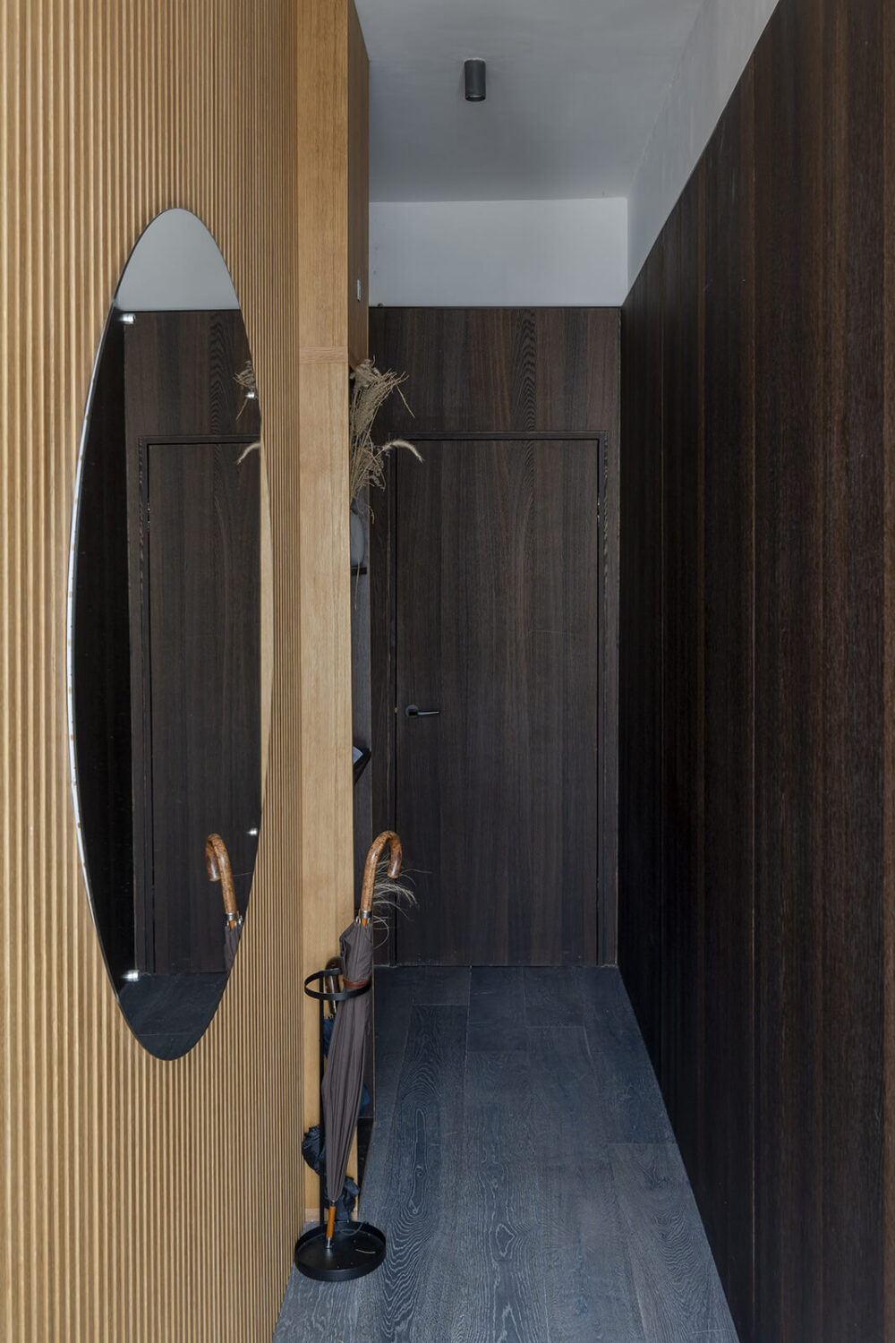 A Victorian House with Stylish Contemporary Interiors 7 hallway-oak-paneling-large-round-mirror-nordroom