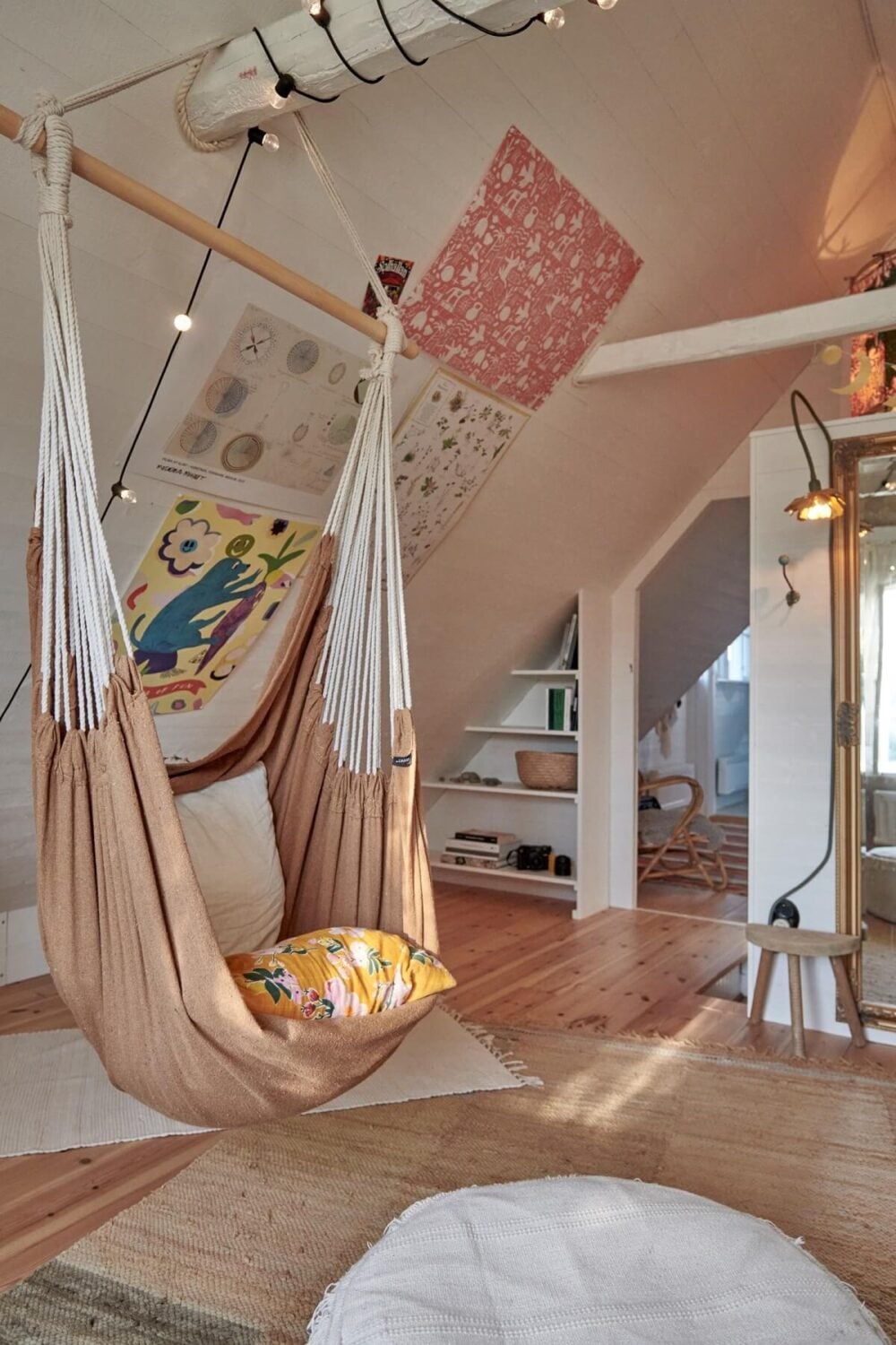Natural Light in a Charming Swedish Country House 22 hanging-chair-kids-bedroom-slanted-ceiling-nordroom