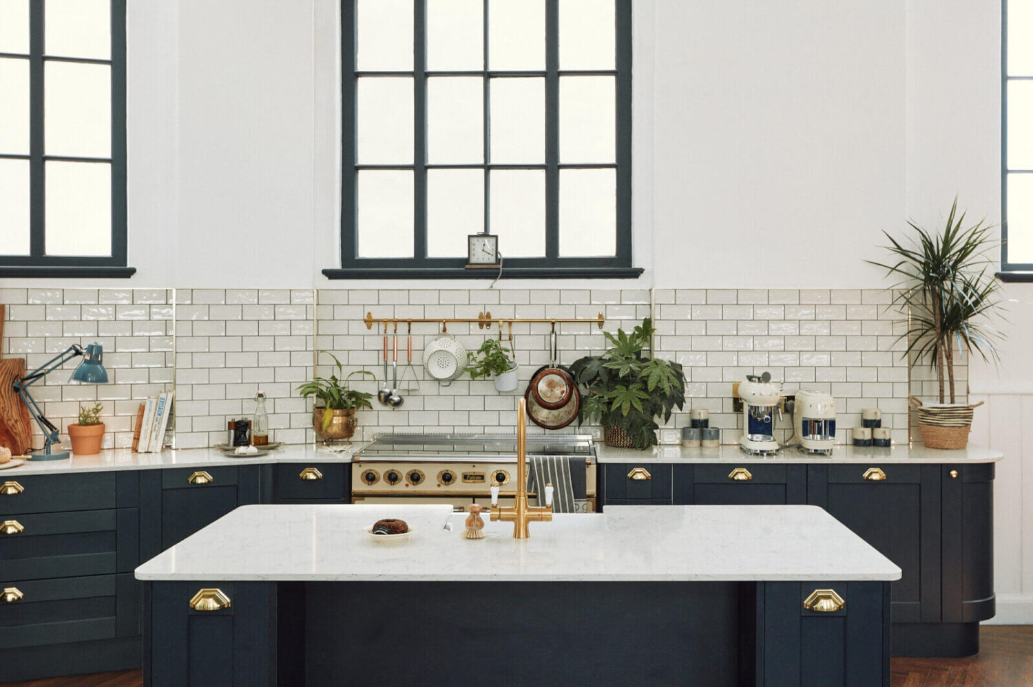 Loft Style Spaces in a Renovated Salvation Army Hall 8 kitchen-island-dark-blue-cabinets-nordroom