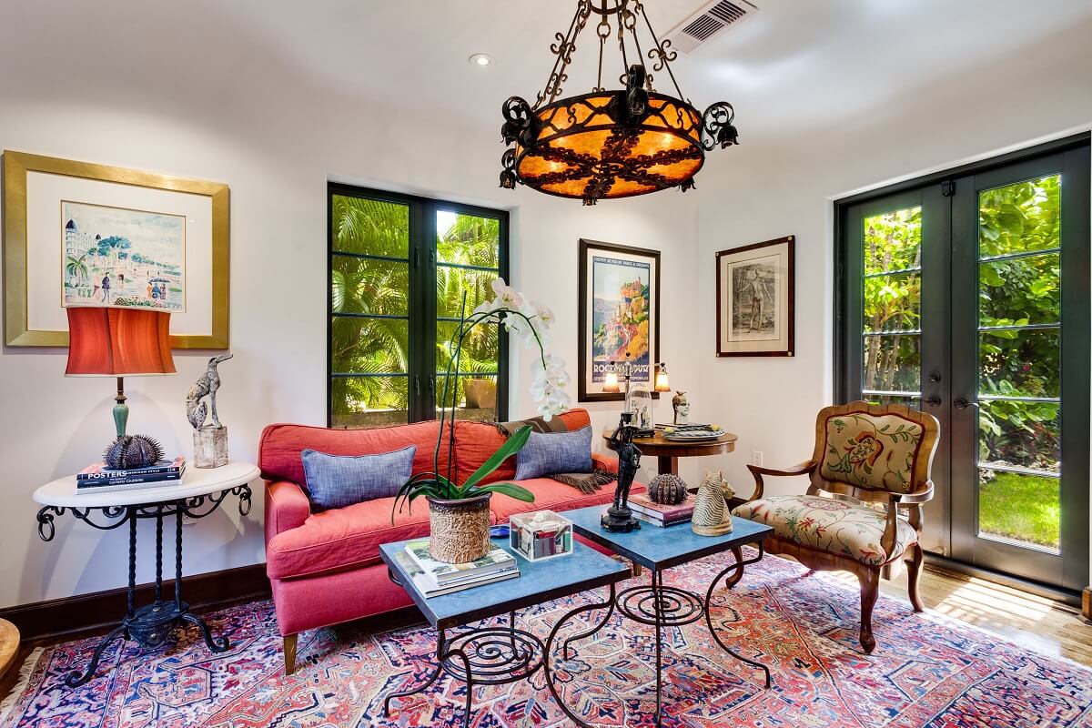 A Beautiful Spanish Style Home in Florida 12 kitchen-seating-area-pink-couch-nordroom