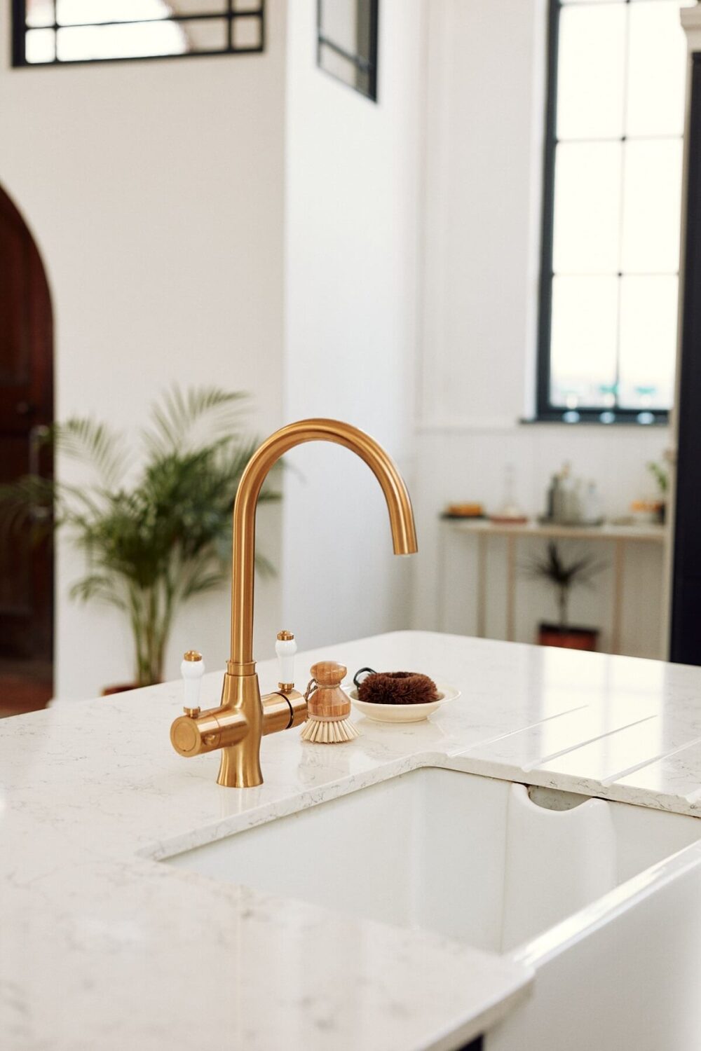 Loft Style Spaces in a Renovated Salvation Army Hall 10 kitchen-sink-brass-tap-nordroom