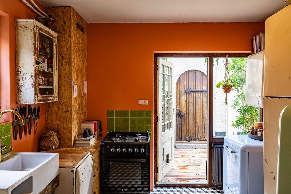 A Colorful Church Conversion in The Netherlands 15 kitchen-terracotta-walls-green-tiles-nordroom
