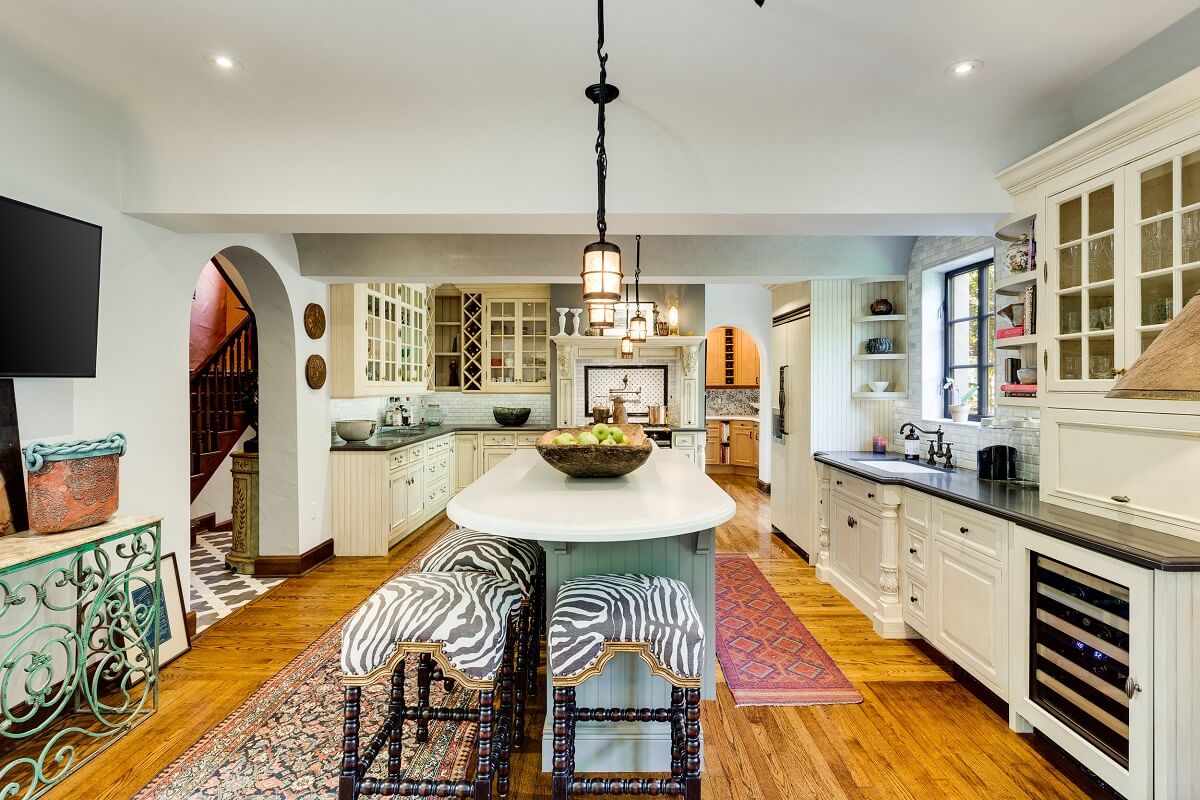 A Beautiful Spanish Style Home in Florida 9 large-kitchen-with-island-wooden-floor-nordroom