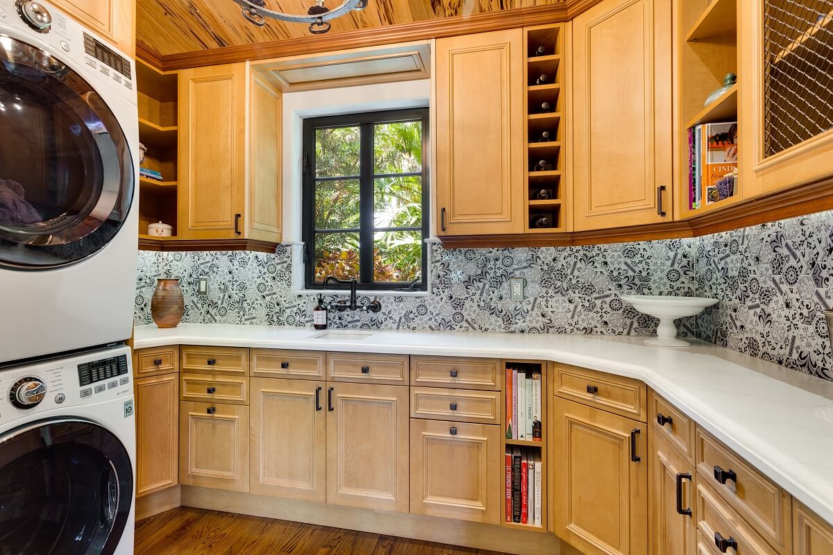 A Beautiful Spanish Style Home in Florida 8 laundry-room-wooden-cabinets-nordroom