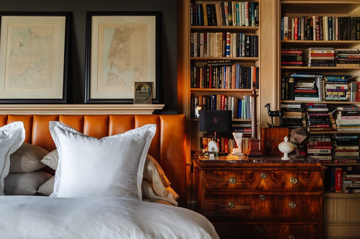 Black Accents in a Traditional Los Angeles Home 22 leather-headboard-built-in-bookshelfs-bedroom-nordroom