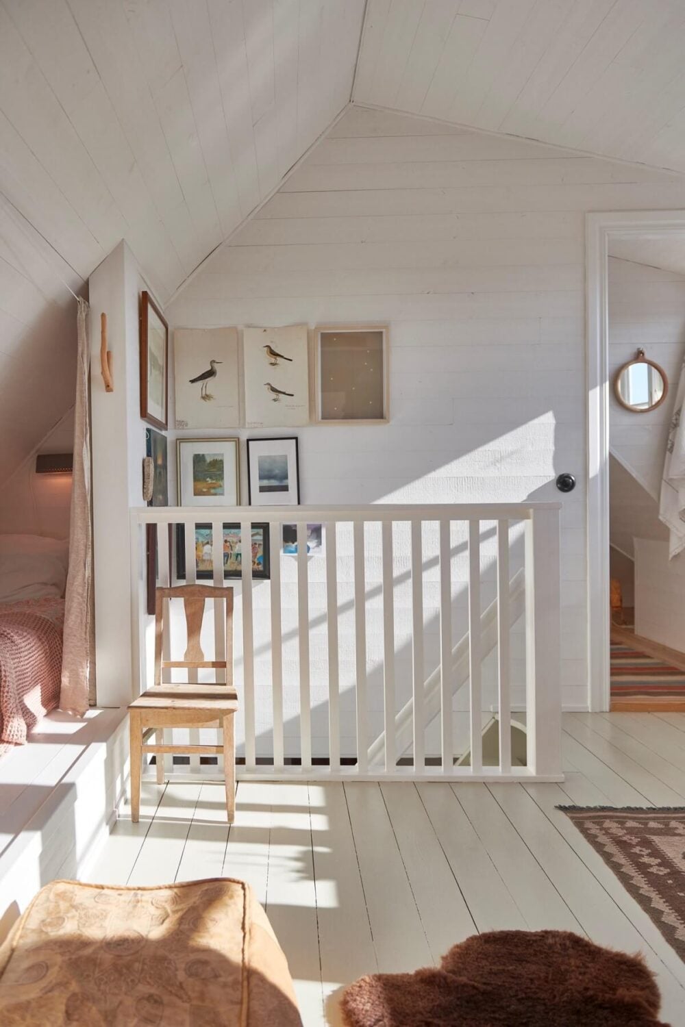 Natural Light in a Charming Swedish Country House 19 light-attic-room-built-in-bed-dividing-curtain-nordroom