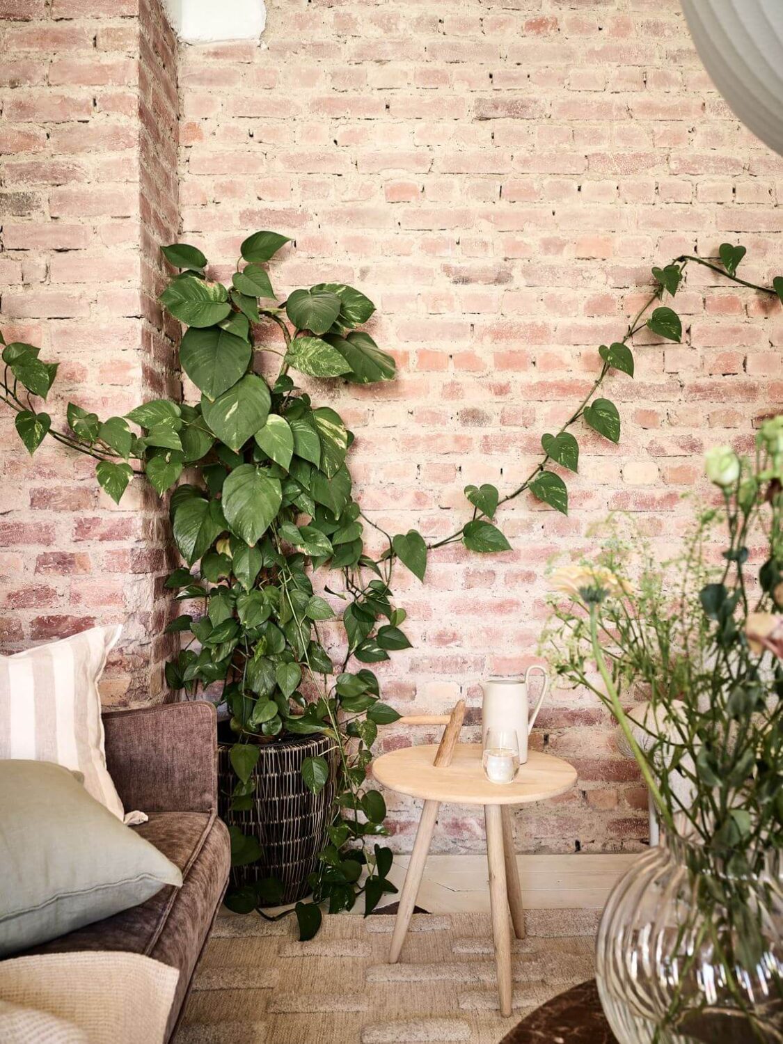 A Swedish Apartment with an Exposed Brick Wall 3 living-room-detail-exposed-brick-wall-nordroom