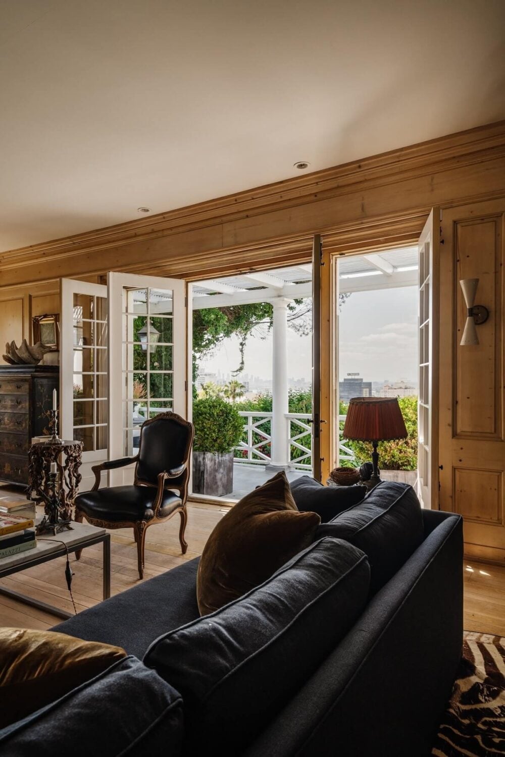 Black Accents in a Traditional Los Angeles Home 11 living-room-doors-leading-to-veranda-nordroom