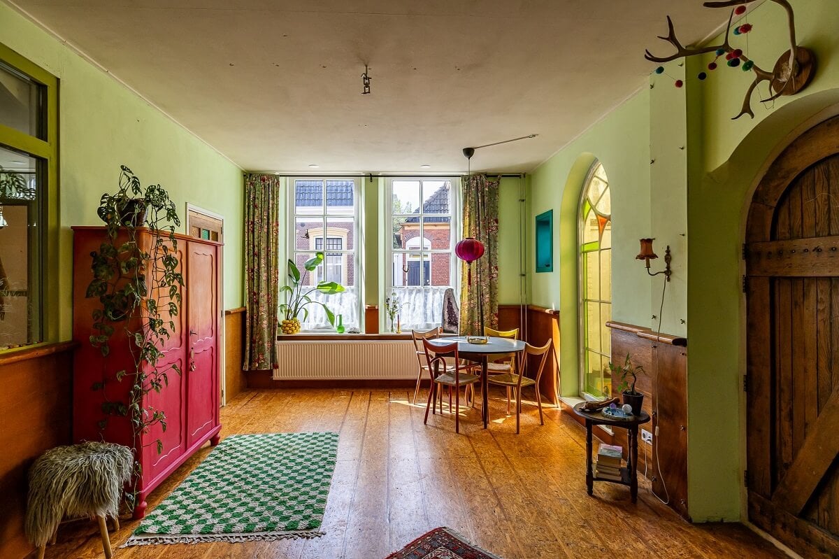 A Colorful Church Conversion in The Netherlands 6 living-room-wooden-floorboards-green-walls-nordroom