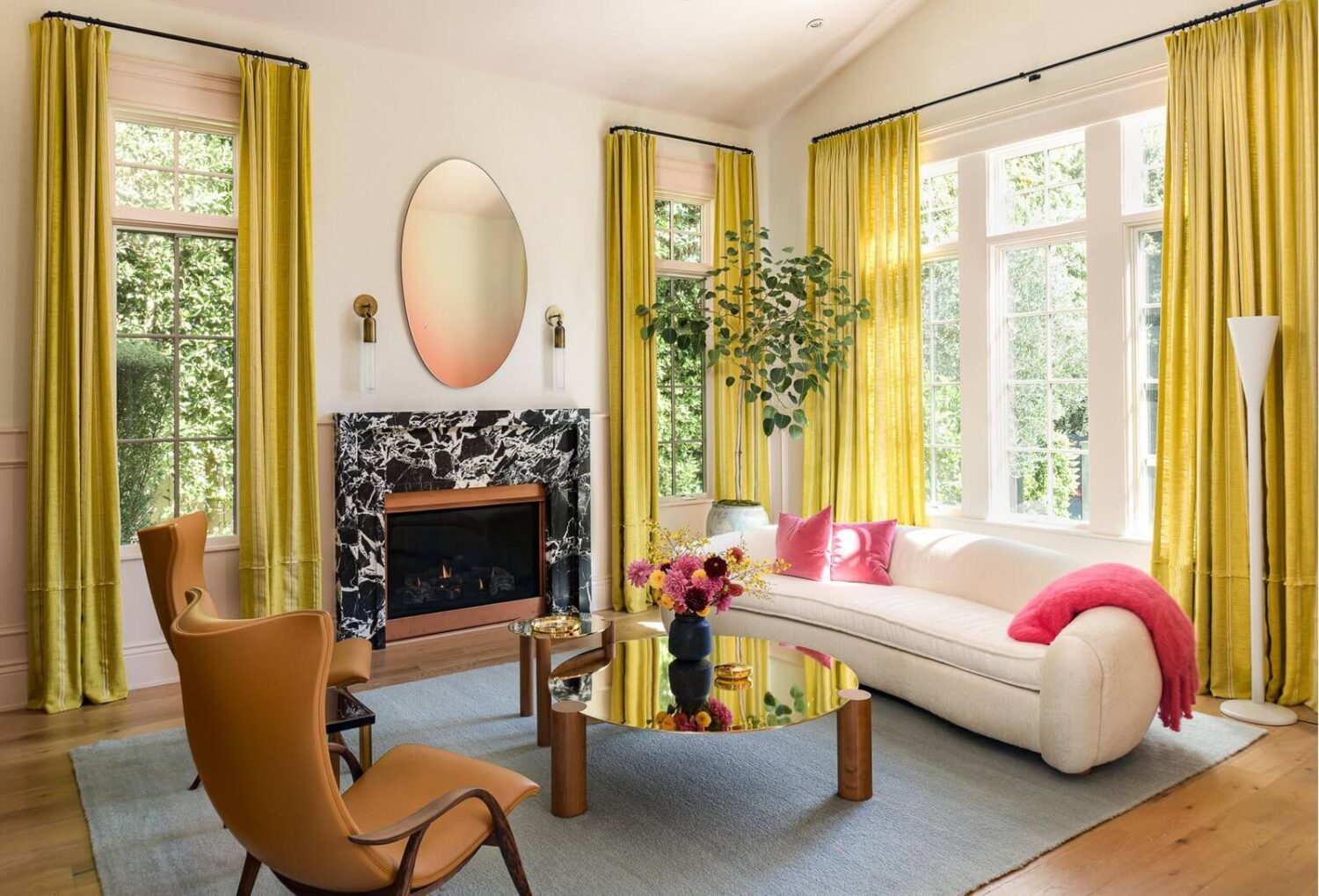17 Shades of Pink in Fredrik Eklund's Beverly Hills Home 4 living-room-yellow-curtains-blue-rug-nordroom