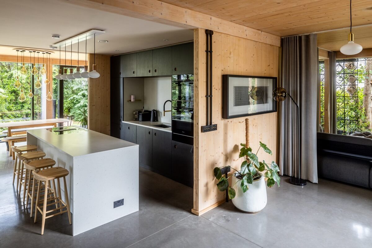 A Modern English Home with a Sculptural Facade 10 modern-kitchen-with-island-nordroom