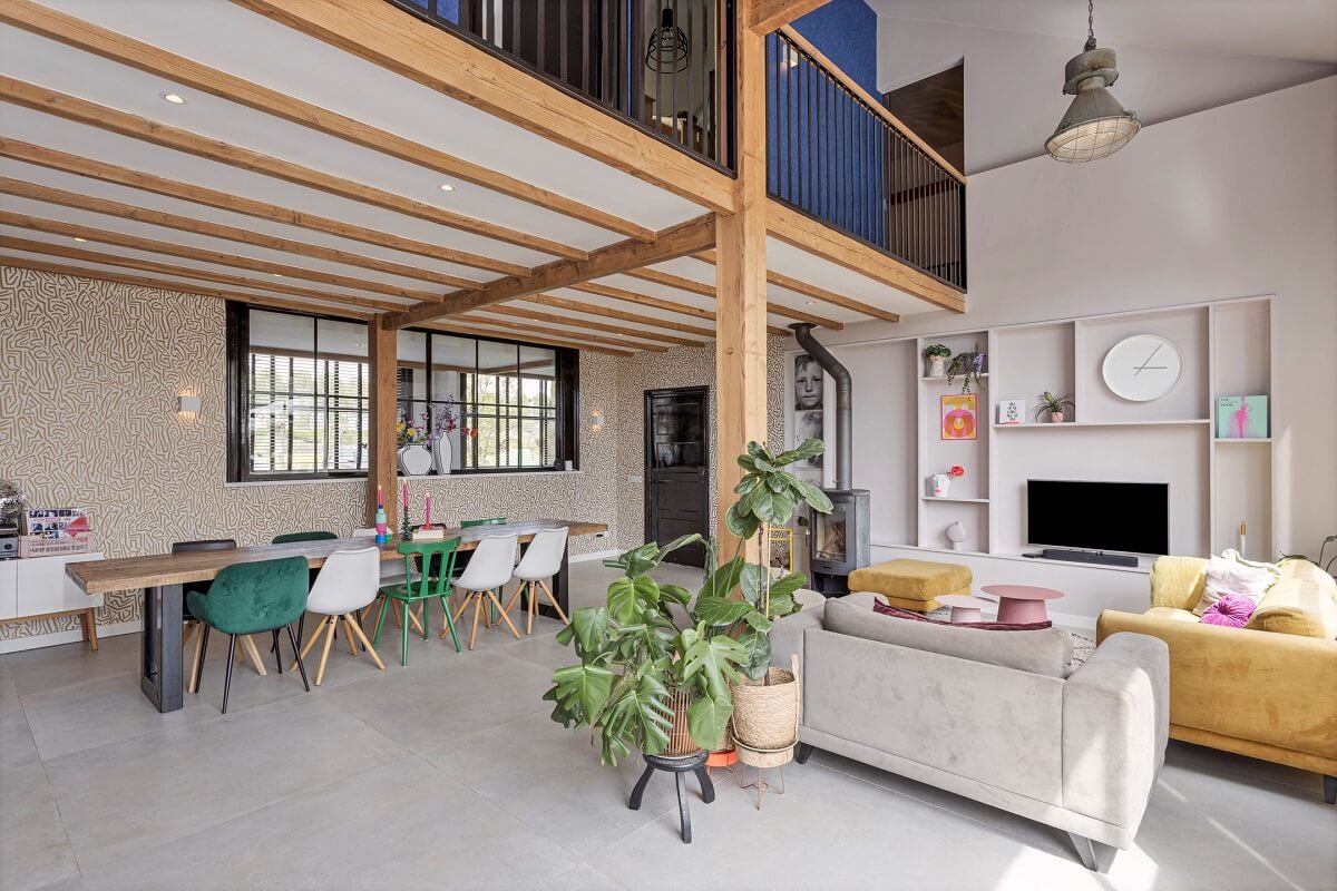 A Colorful School Conversion in The Netherlands 4 open-plan-living-space-loft-area-school-conversion-nordroom