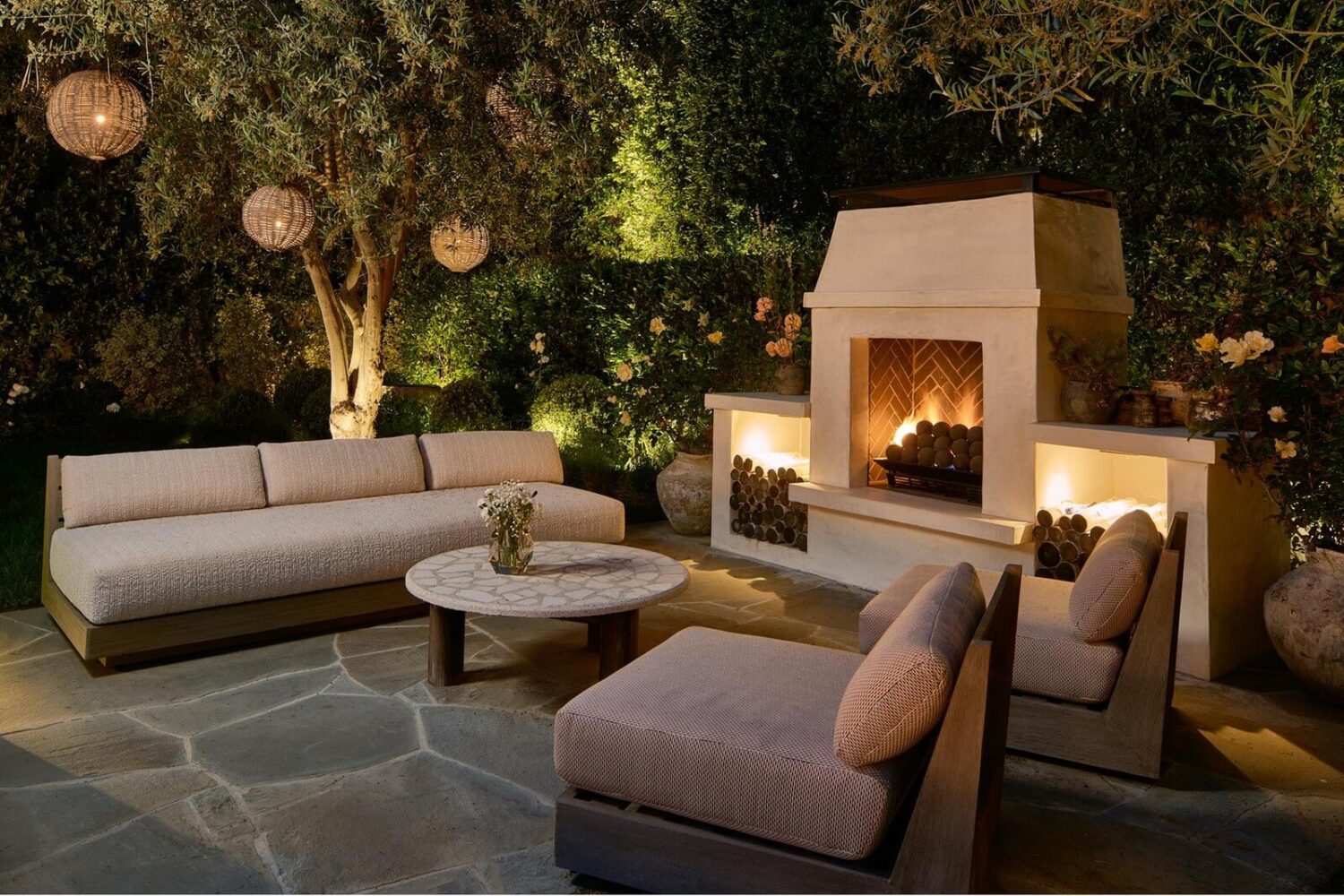 17 Shades of Pink in Fredrik Eklund's Beverly Hills Home 26 outdoor-lounge-area-fireplace-nordroom