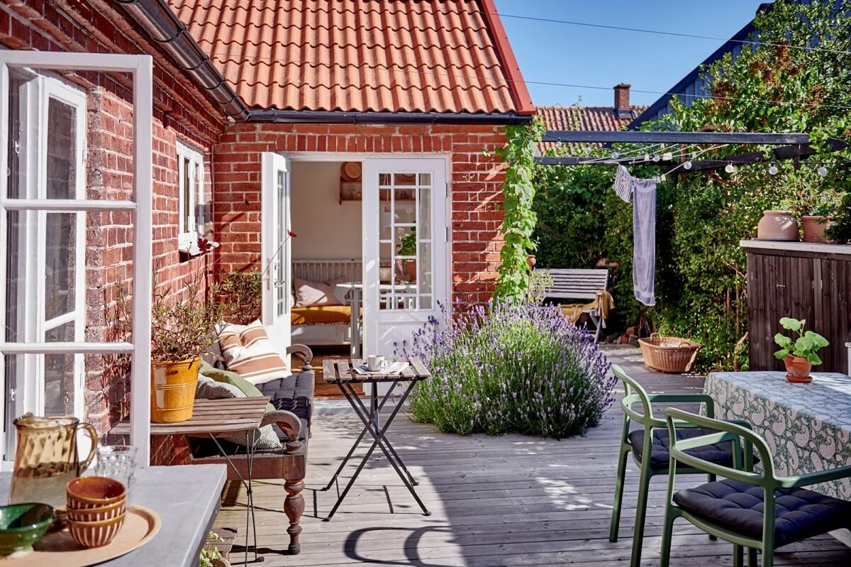 Natural Light in a Charming Swedish Country House 26 outdoor-terrace-garden-swedish-house-nordroom