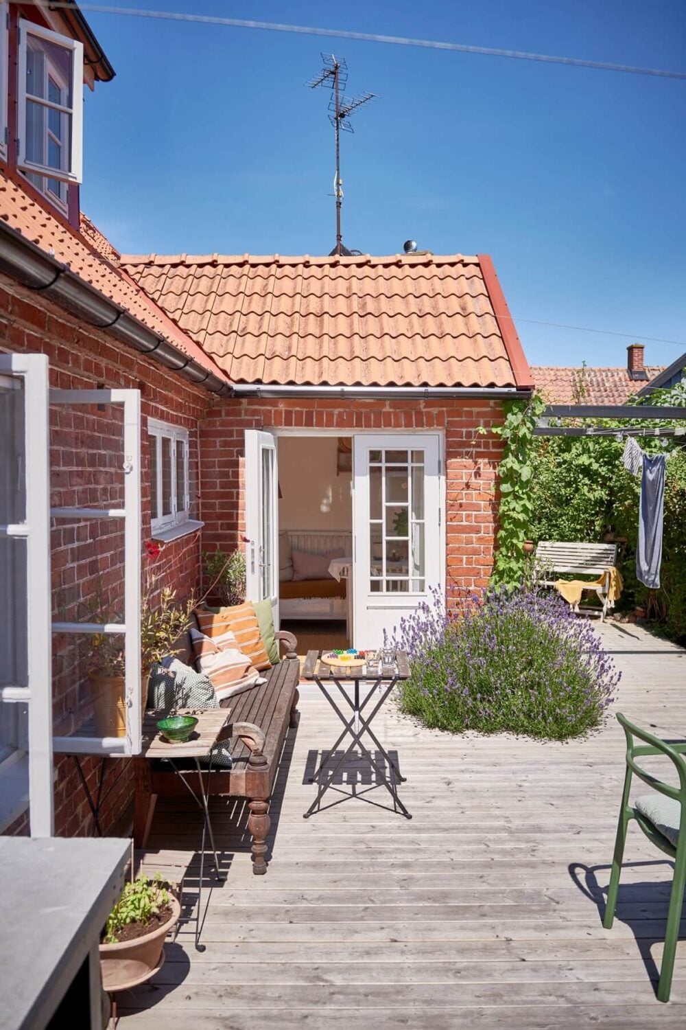 Natural Light in a Charming Swedish Country House 27 outdoor-terrace-swedish-country-house-nordroom