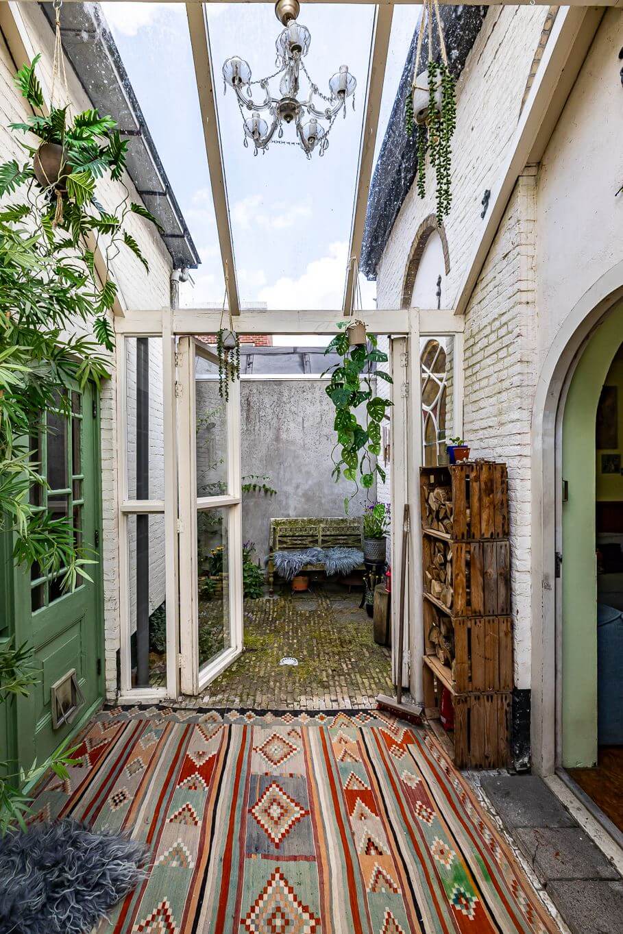 A Colorful Church Conversion in The Netherlands 11 patio-colorful-rug-nordroom