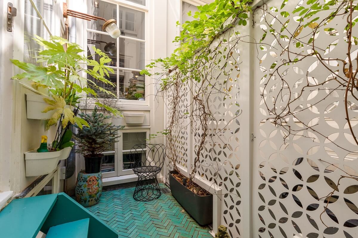 A Family Home in a Historic Canal House 11 patio-green-floor-tiles-plants-nordroom