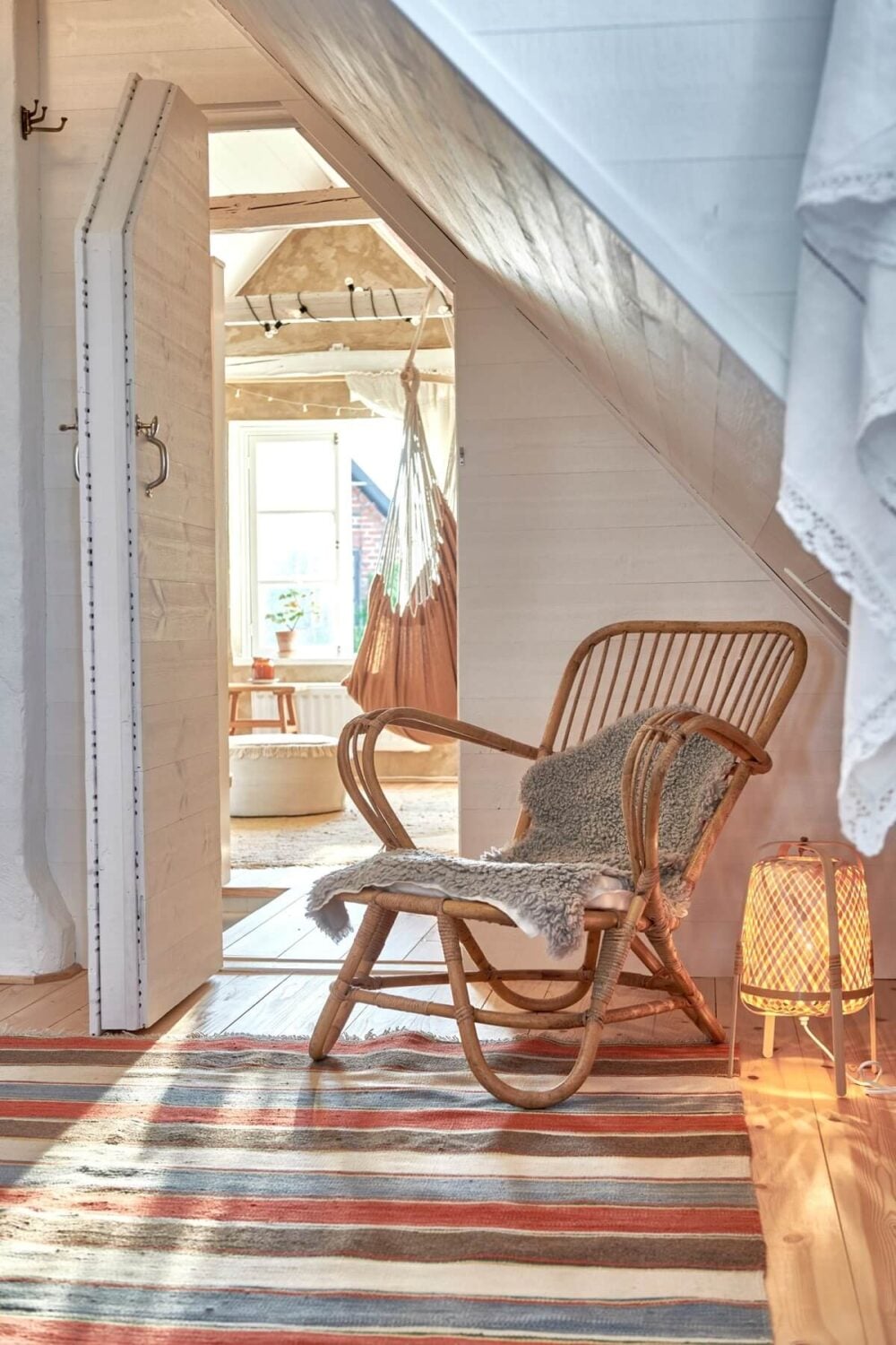 Natural Light in a Charming Swedish Country House 18 rattan-lounge-chair-swedish-house-nordroom
