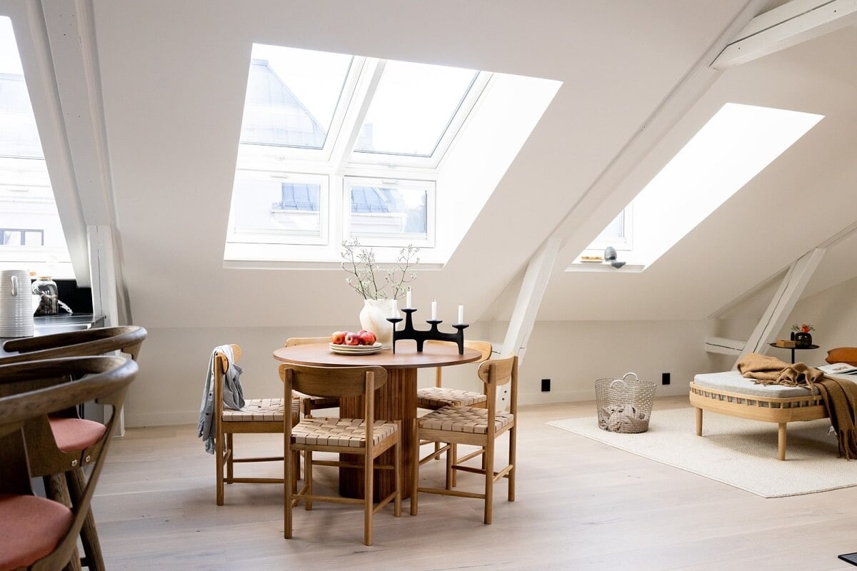 A Bright Penthouse Apartment in Oslo 5 round-wooden-dining-table-attic-apartment-nordroom