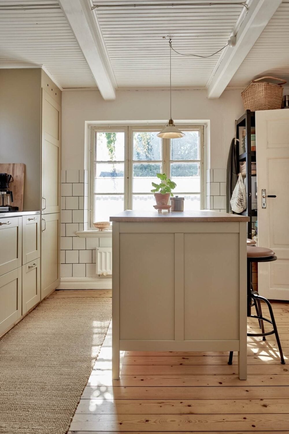Natural Light in a Charming Swedish Country House 9 scandinavian-kitchen-wooden-floorboards-nordroom