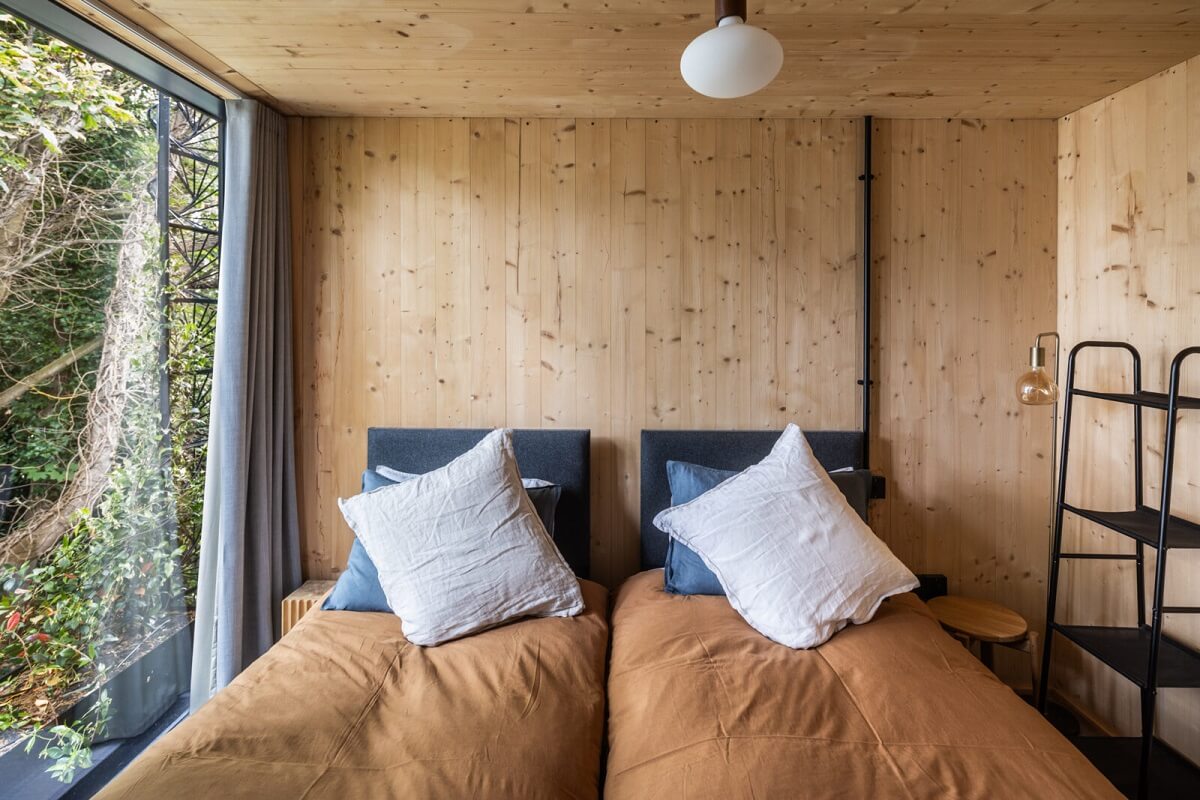 A Modern English Home with a Sculptural Facade 20 small-wooden-bedroom-nordroom