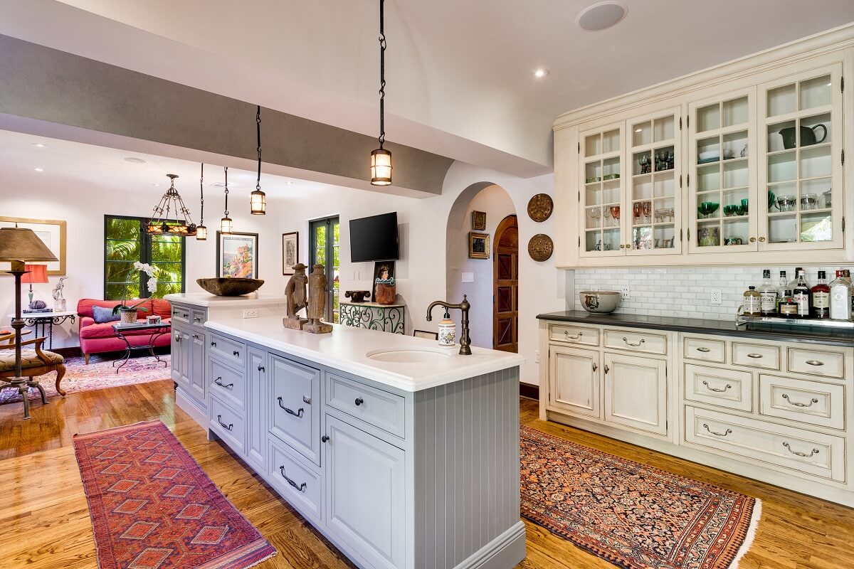 A Beautiful Spanish Style Home in Florida 10 social-kitchen-island-pink-sofa-nordroom
