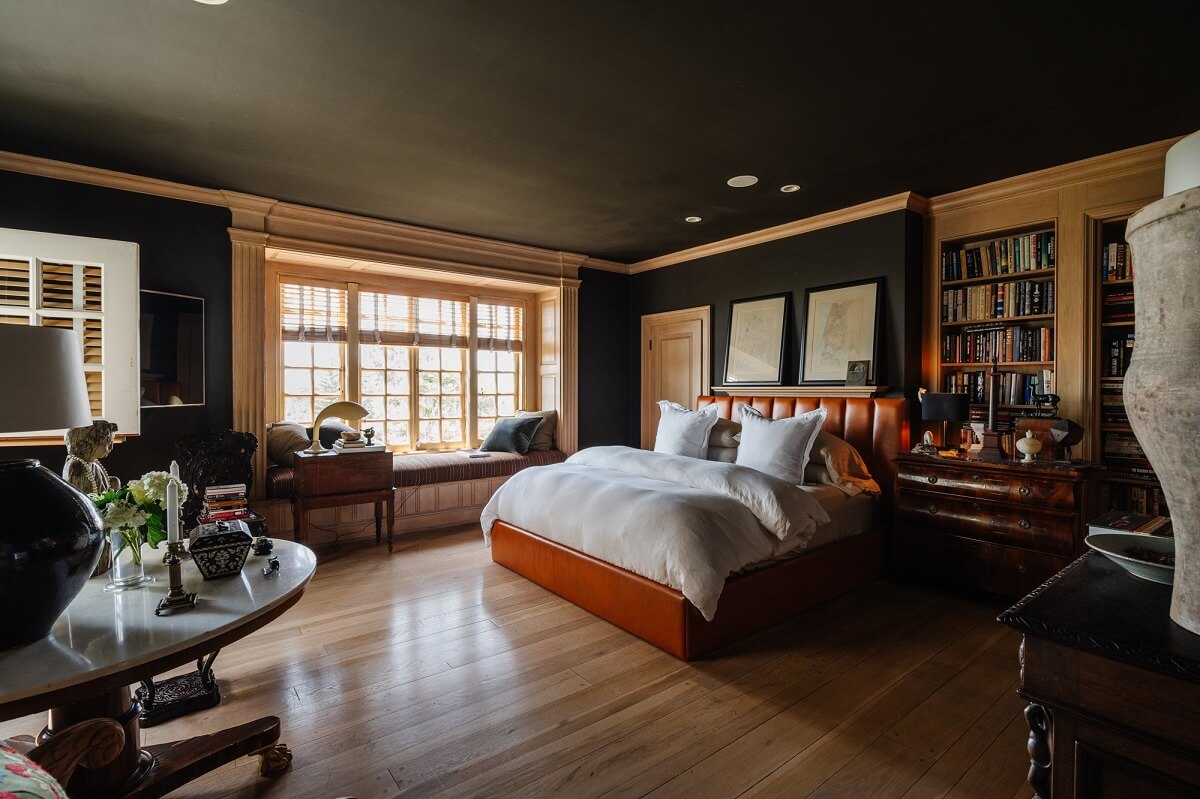 Black Accents in a Traditional Los Angeles Home 20 spacious-bedroom-black-ceiling-leather-headboard-nordroom