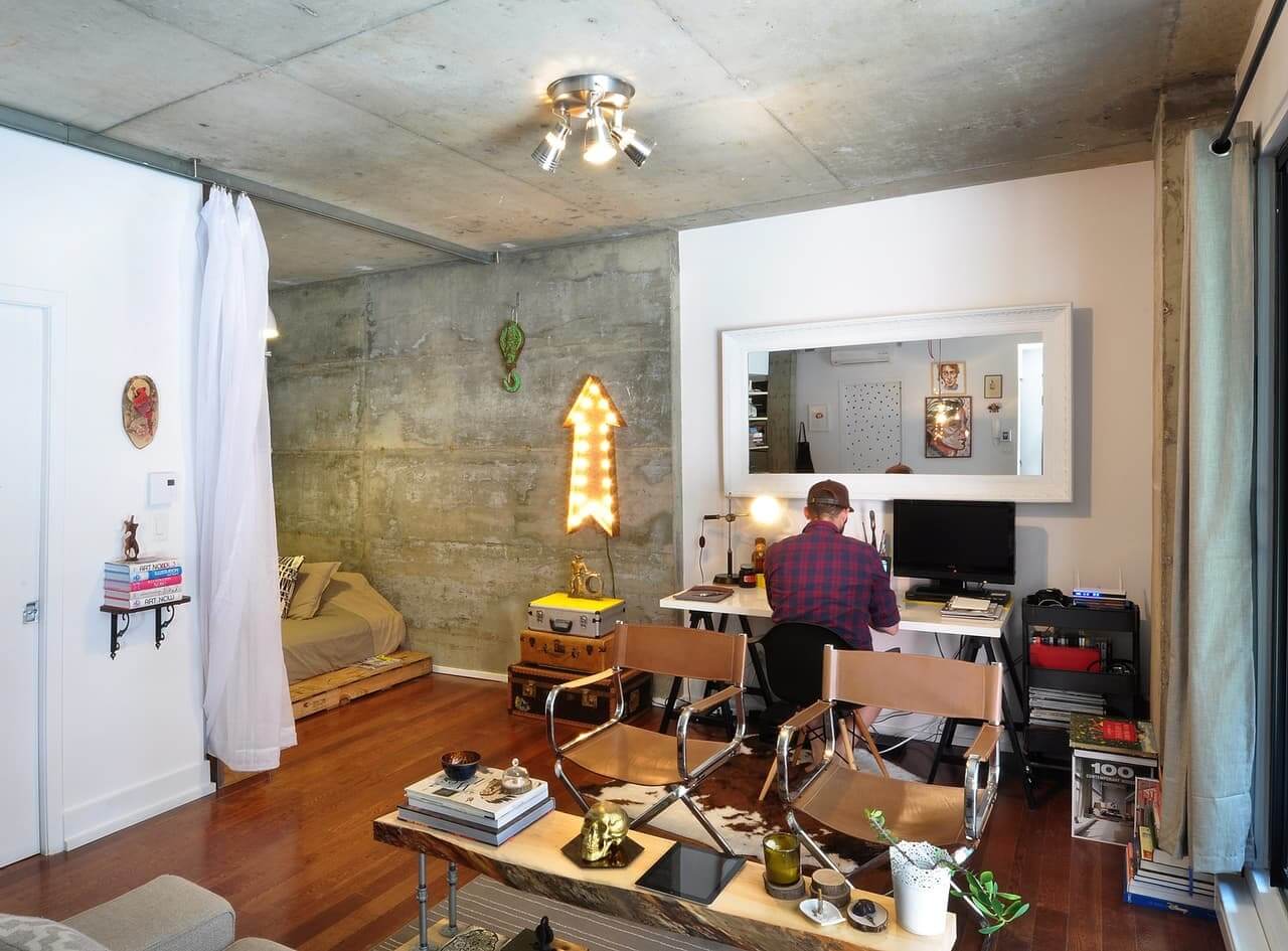 53 Studio Apartments with a Curtain Room Divider 46 studio-apartment-concrete-walls-curtain-room-divider-nordroom