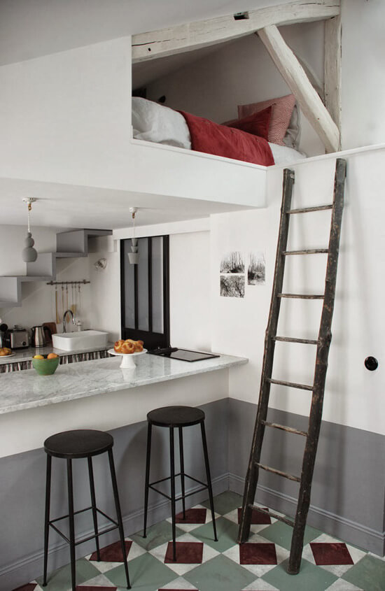43 Ideas To Divide a Studio Apartment Into Multiple Rooms 39 studio apartment loft bed above the kitchen nordroom 43 Ideas To Divide a Studio Apartment Into Multiple Rooms